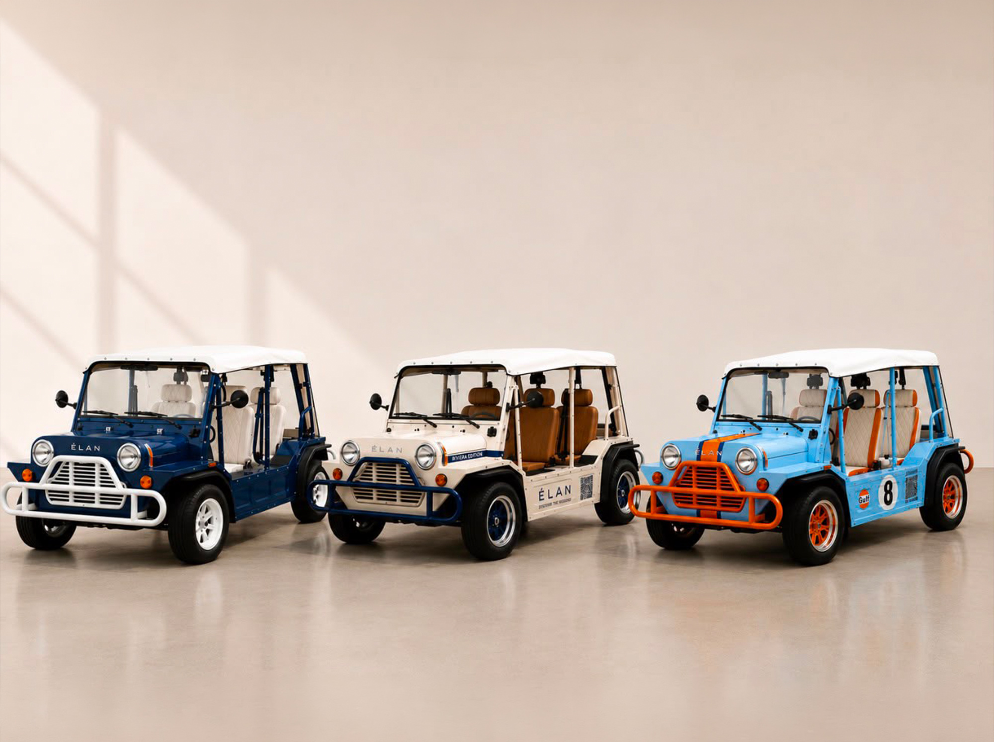 Three Élan builds side by side: navy, Riviera Edition cream and Gulf racing blue